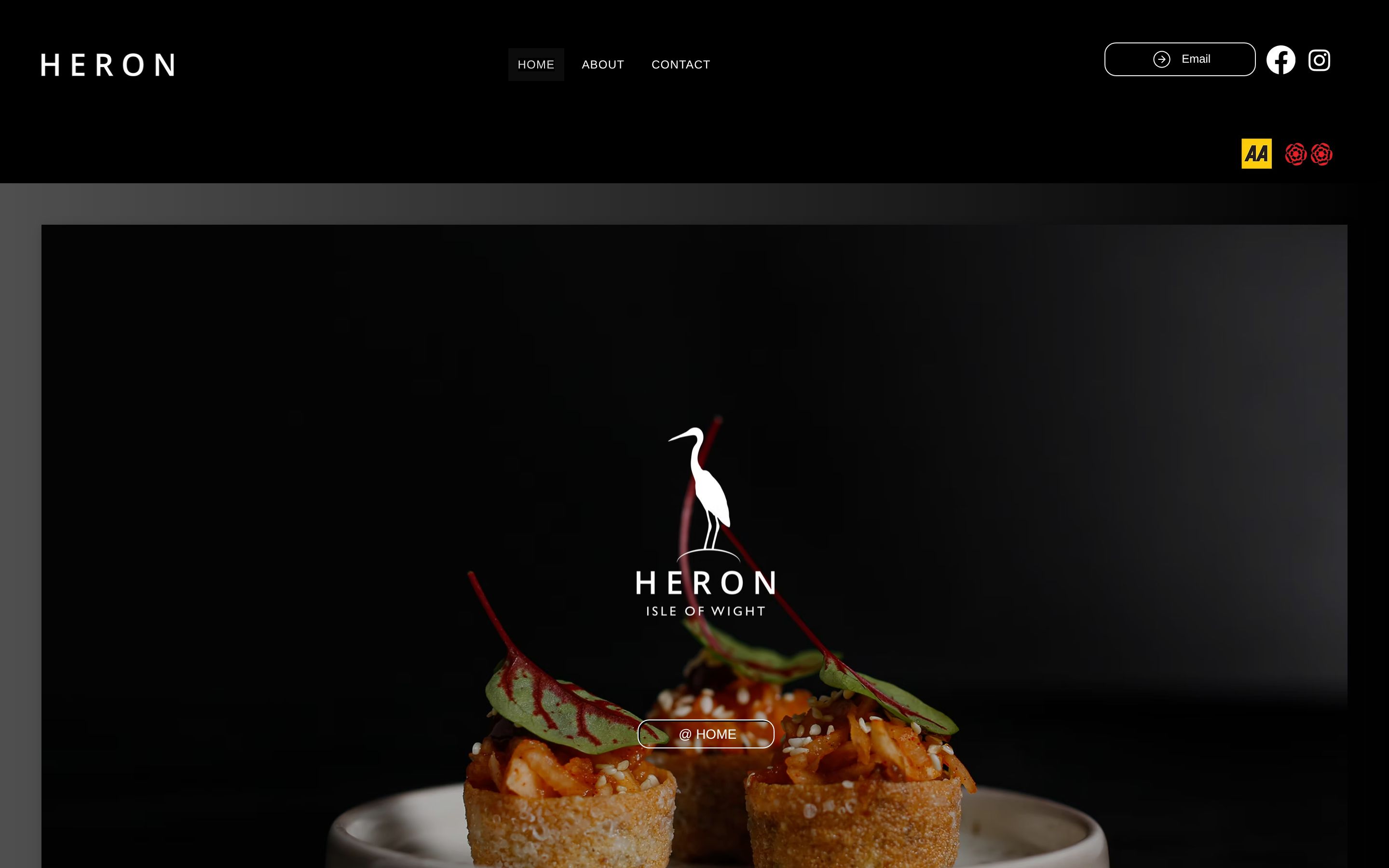 The Heron website shown on desktop